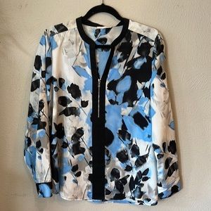 Calvin Klein graphic floral blue women’s top. Size large.